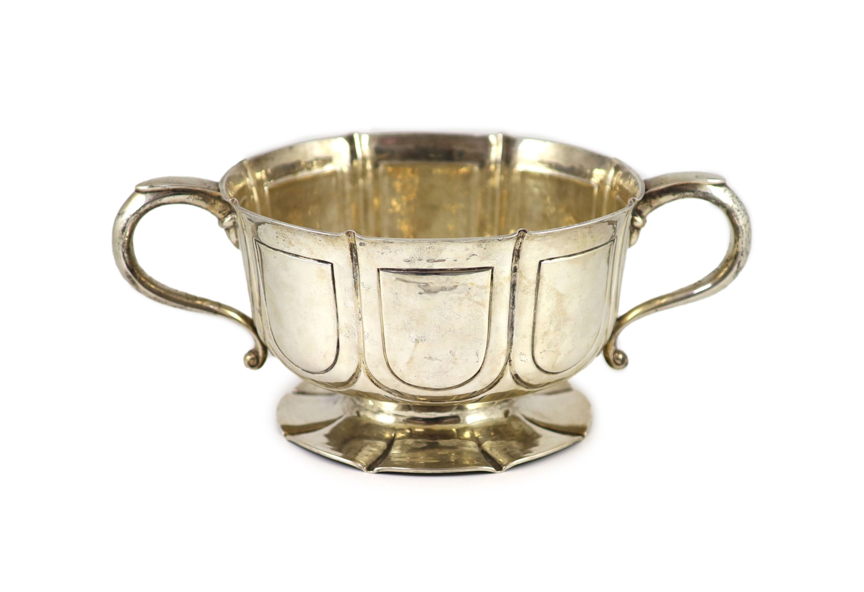 An Edwardian silver two handled pedestal fruit bowl, by William Comyns